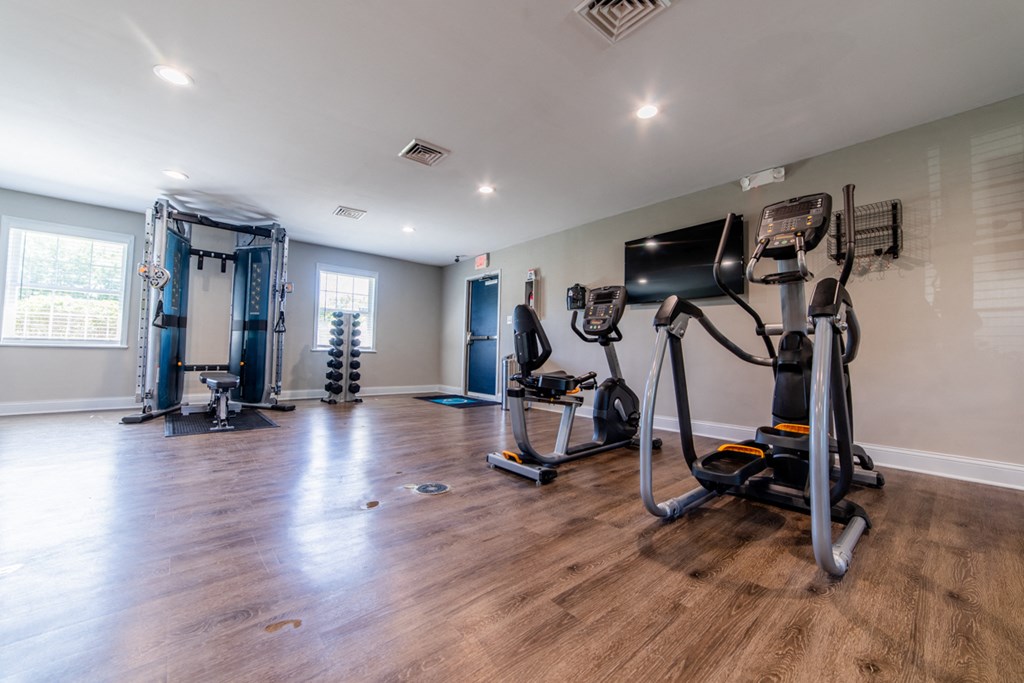 Fitness center at Ashton Brook Apartments features cardio and weight training equipment