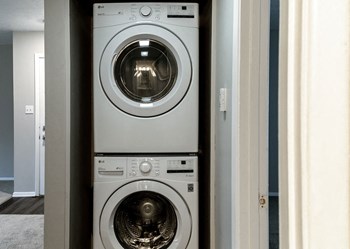 In-Unit Laundry Available in Select Units at Woodbridge Apartments Bloomington - Photo Gallery 26