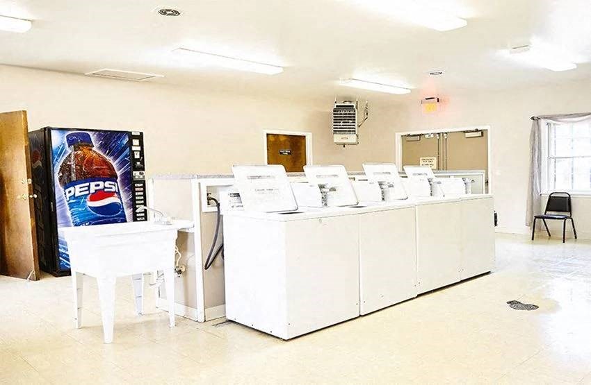 an empty store with a pepsi vending machine