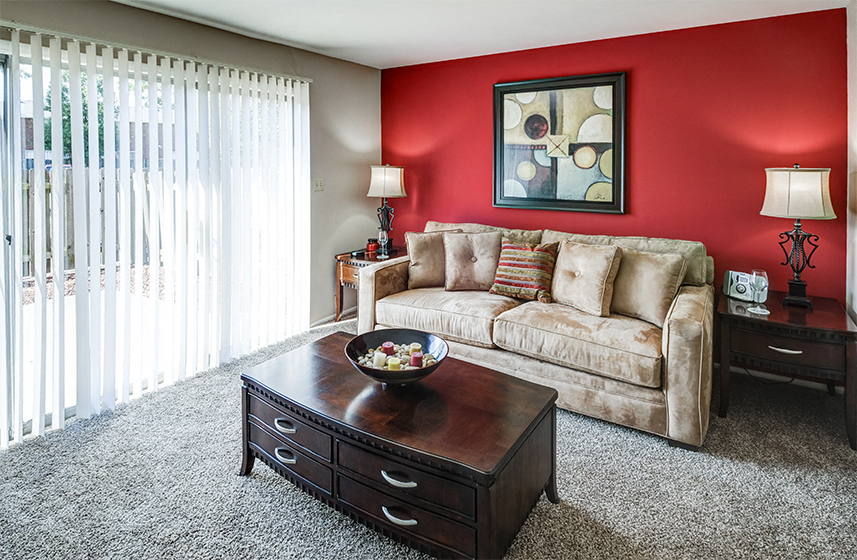 Living Room with patio access at Ashton Pointe Apartments