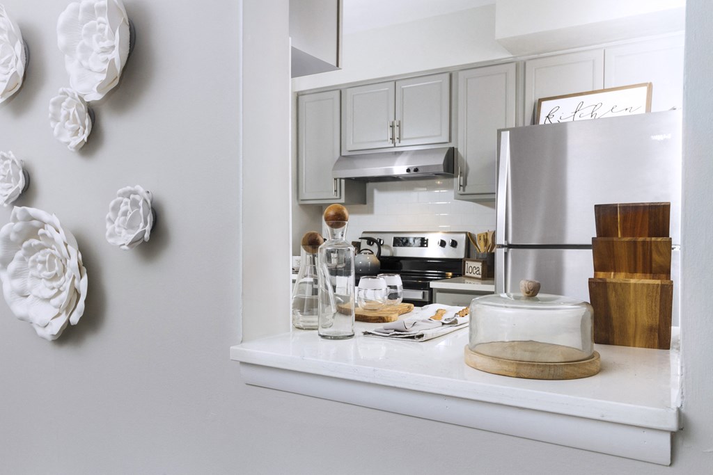 Kitchen with pony wall and some counter space  Newly renovated apartment with fully-equipped kitchen including dishwasher at Woods of Fairfax