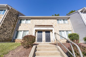 Apartment building exterior at  Woodbridge Apartments Bloomington - Photo Gallery 18