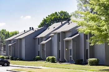 Exterior apartment building at Woodlake Apartments - Photo Gallery 7