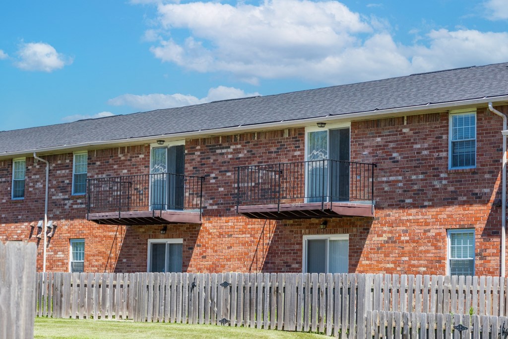 Exterior balcony of an apartment building at Archer's Pointe.