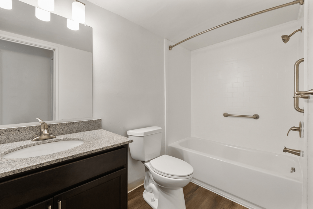 Bathroom in a 1-bedroom, 1-bathroom apartment at Country View Apartments, featuring modern fixtures, and a  tub.