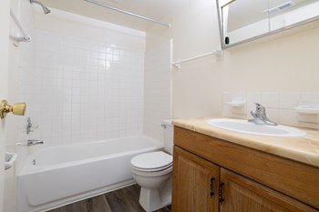 Bathroom in a 2 bedroom apartment at Woodlake Apartments - Photo Gallery 13