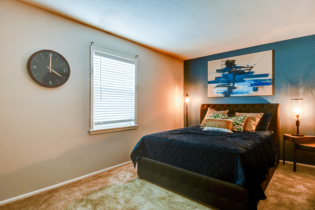 Bedroom in a 1-bed, 1-bath apartment at Ashton Brook, featuring natural light and ample space for furniture.