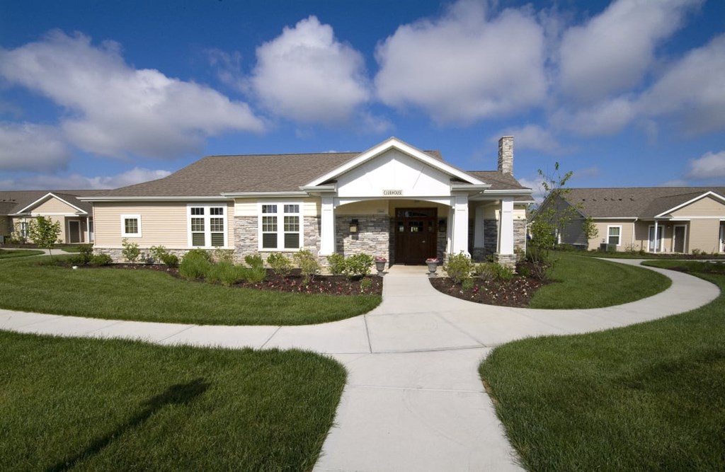 Front view of Meredith Meadows Apartments building exterior.