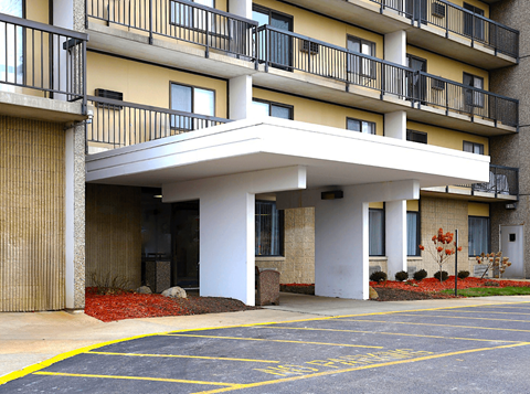 Exterior view of the entrance to Kentwood Square Apartments.