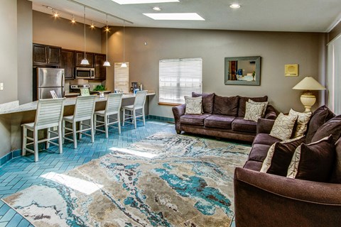 Clubhouse community kitchen and entertainment area at Cedar Ridge Apartments