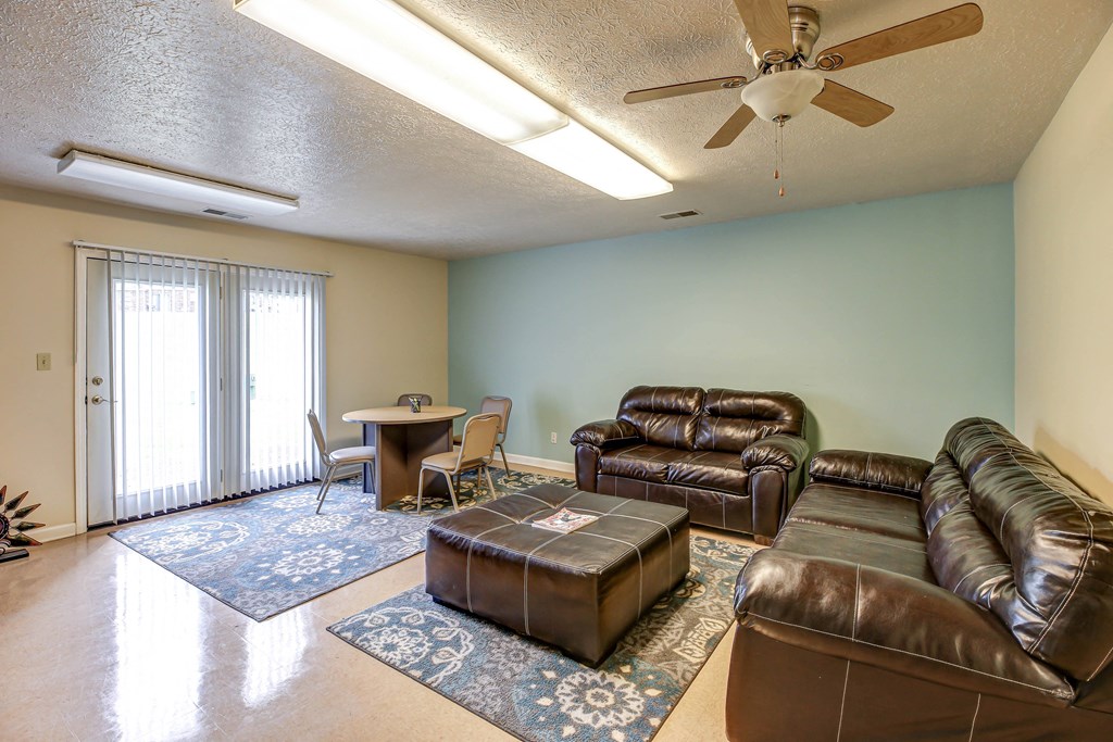 Clubhouse lounge at Valley Ridge Apartments featuring comfortable seating.
