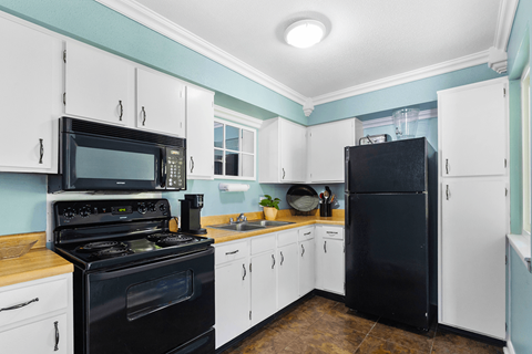 Community room kitchen at Blueridge Terrace Apartments.