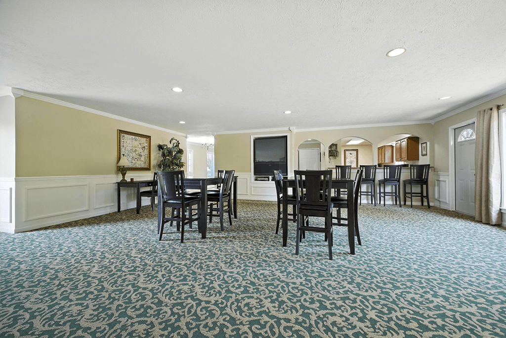 Community room seating area at Ashton Pointe Apartments.