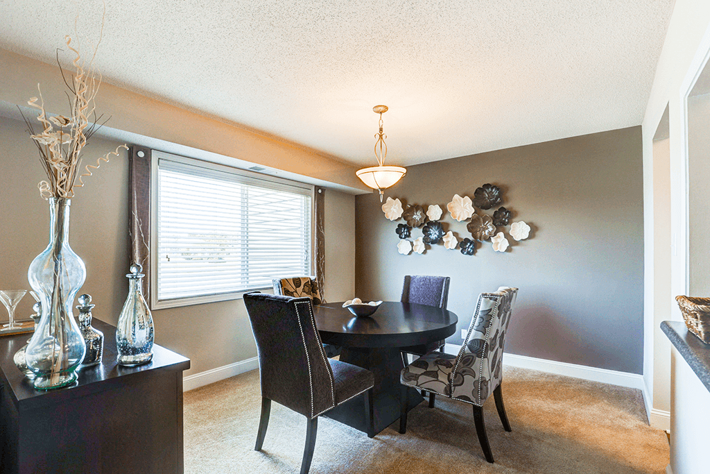 Dining room in a signature series 2-bedroom, 2-bath apartment at Somerset Lakes.