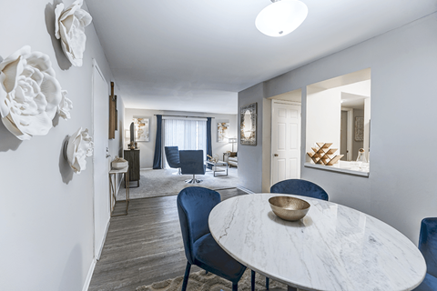 Dining and living room in a 2-bedroom, 1-bath at The Woods of Fairfax Apartments, Virginia 22079