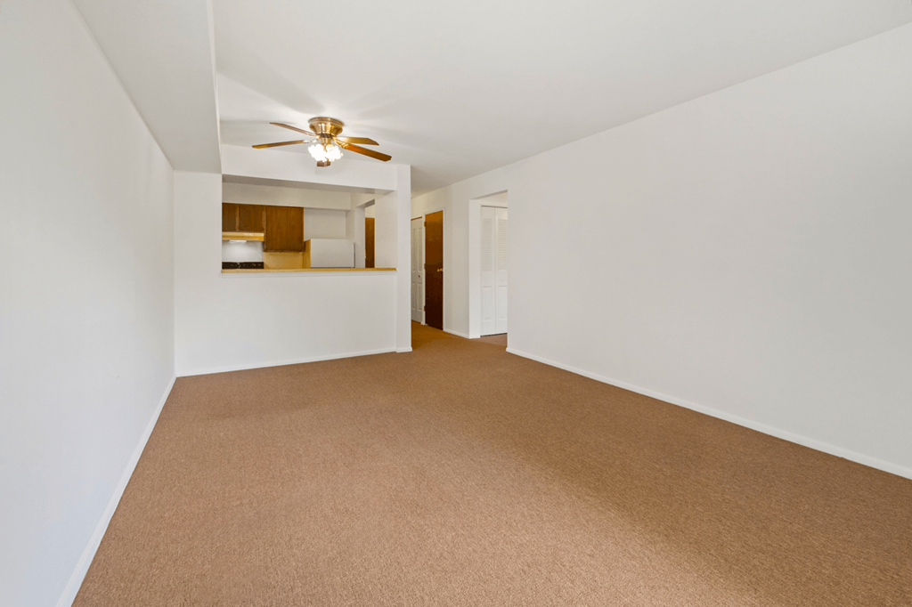 Dining room and kitchen in a 1-bedroom, 1-bath senior apartment at Northwood Apartments in Franklin.
