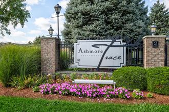 Entrance with beautiful landscaping at Ashmore Trace