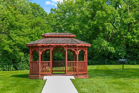 Gazebo and picnic area at Blueridge Terrace Apartments, surrounded by green space and landscaping.