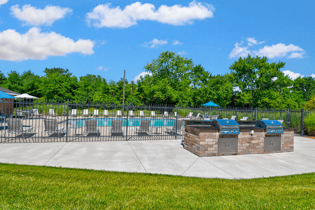 Grilling station at Ashton Brook Apartments, featuring outdoor grills.