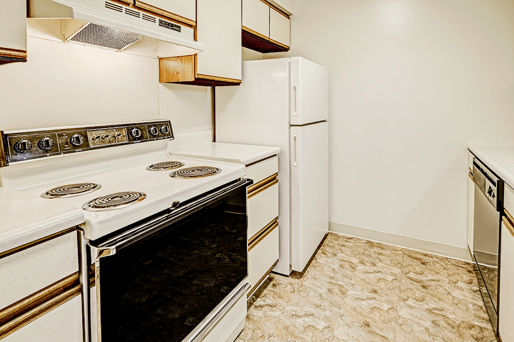 Kitchen with appliances at Thompson Village Apartments, Indianapolis
