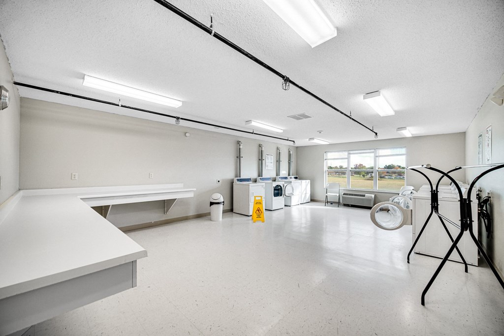 Laundry center with folding station at Kirby Manor
