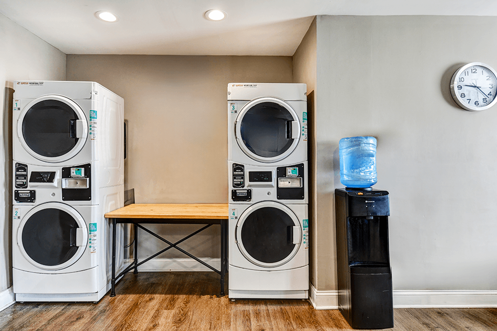 Laundry facility at Ashton Brook Apartments, featuring washers and dryers.