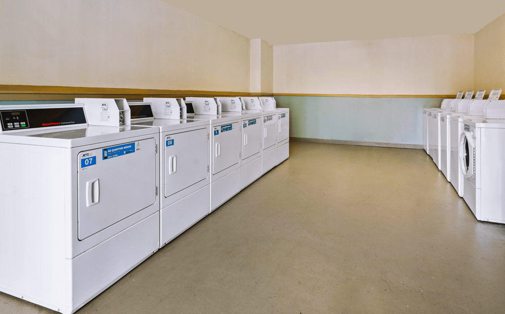 Well-equipped laundry facility at Country View Apartments offering residents easy access to laundry services.