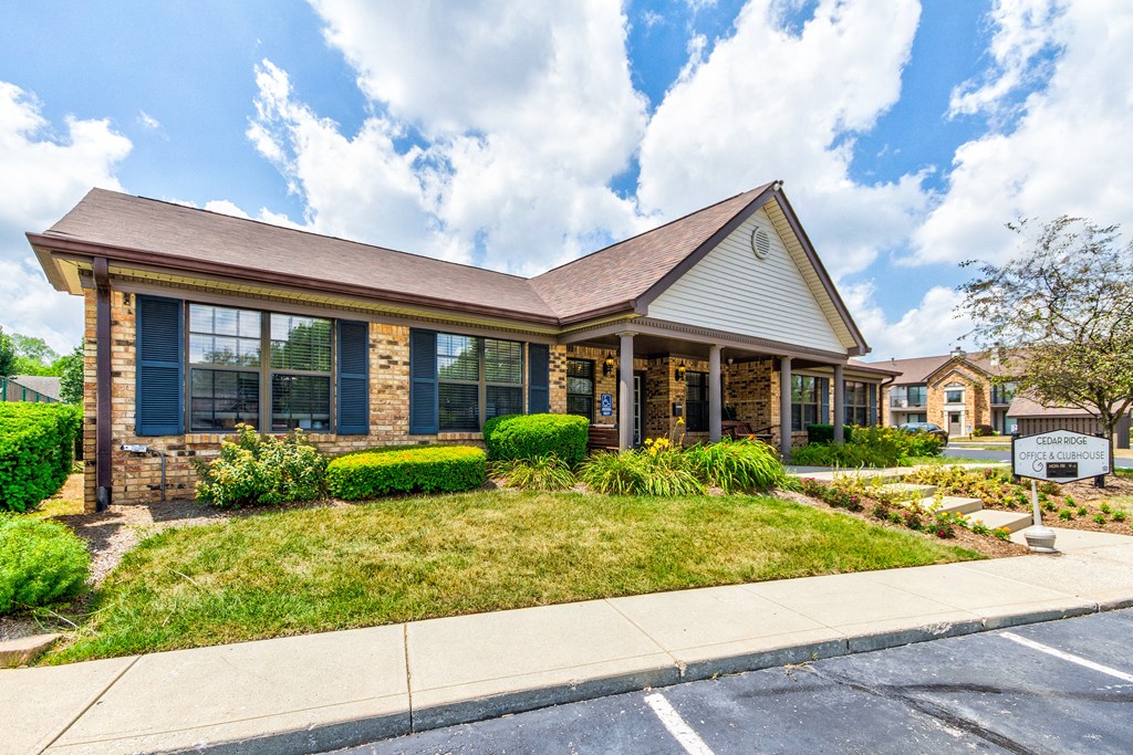Clubhouse Exterior at Cedar Ridge Apartments Leasing office & clubhouse exterior at Cedar Ridge Apartments
