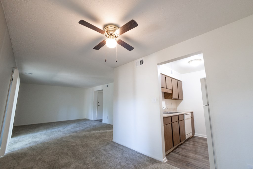 Open living and dining space with kitchen in a 2 Bedroom Apartment  at Woodlake Apartments