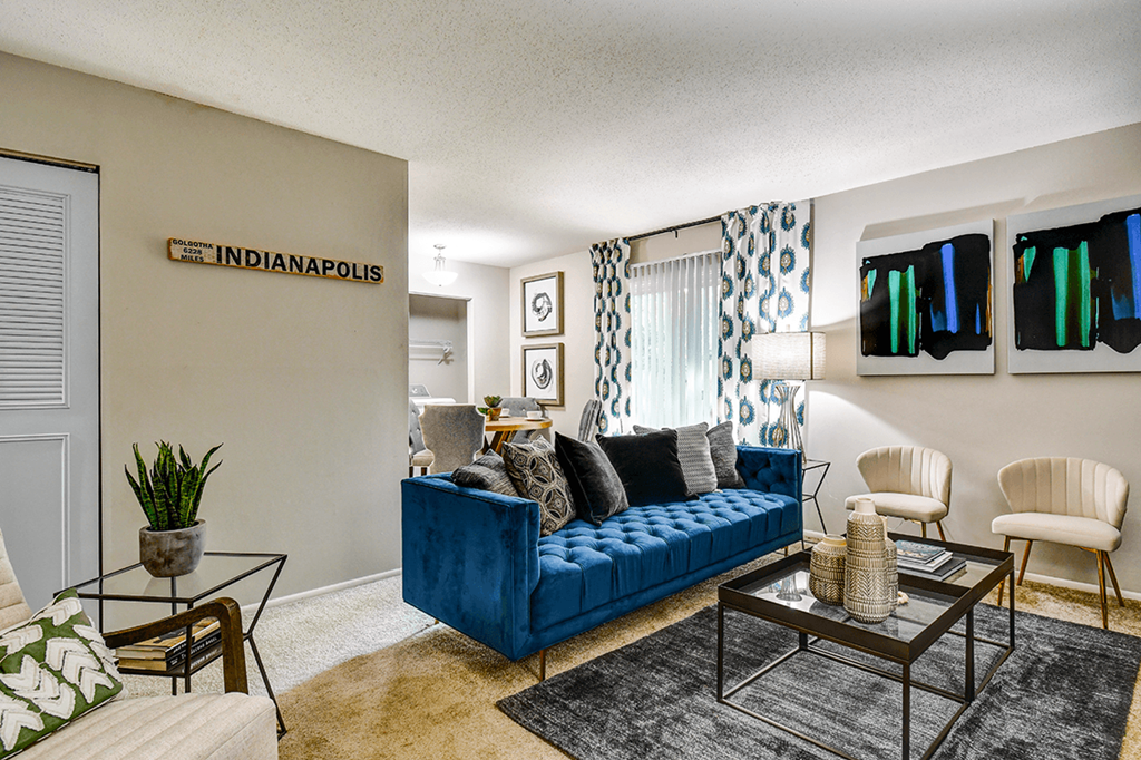Living room in a 1-bed, 1-bath apartment at Ashton Brook, featuring spacious seating, natural light, and a cozy atmosphere.