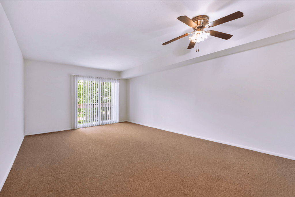 Living room in a 1-bedroom, 1-bath senior apartment at Northwood Apartments in Franklin.