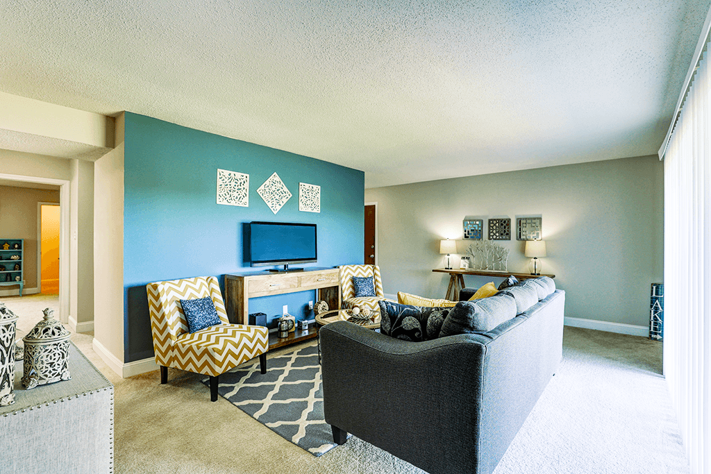 Living room in a Signature series 2-bed, 2-bath apartment at Somerset Lakes, offering a spacious layout.
