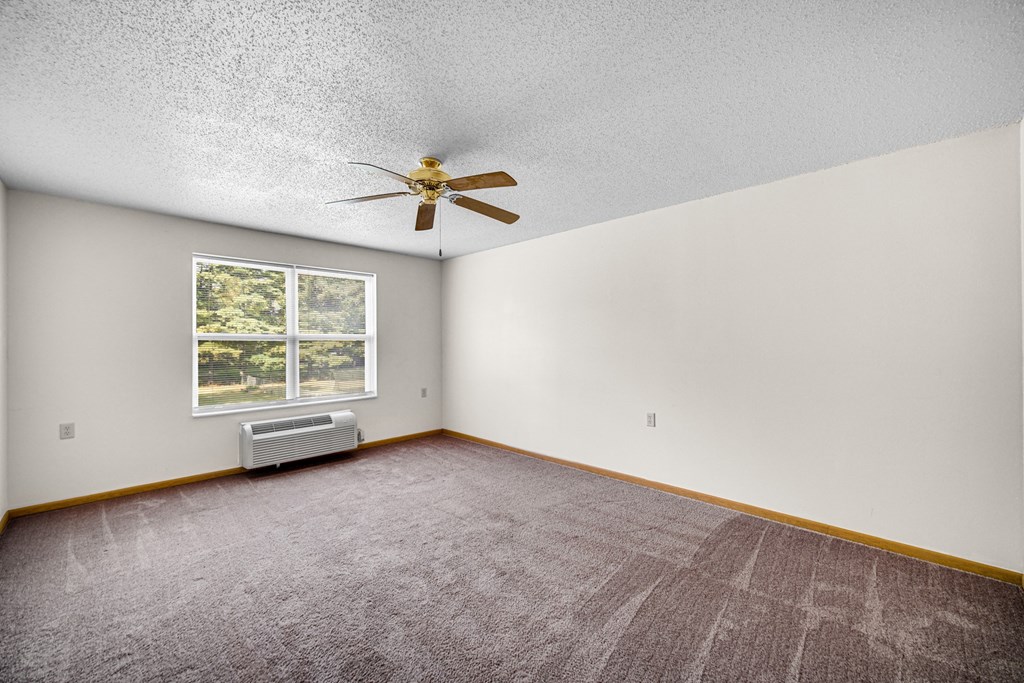 Living room with a window at Kirby Manor