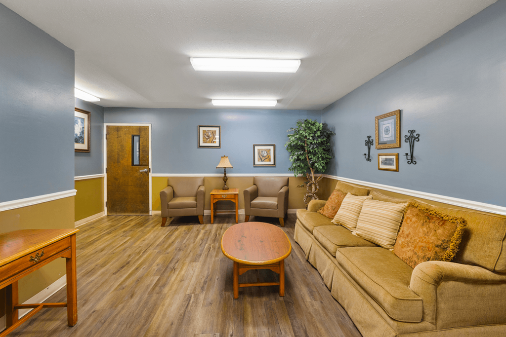 Lobby with comfortable seating in the senior building at Northwood Apartments in Franklin.