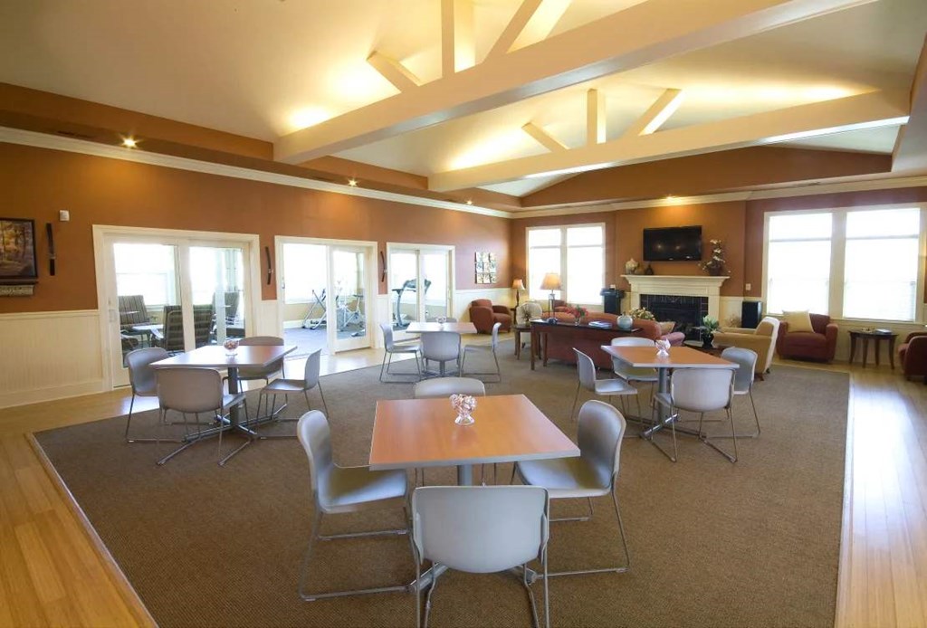 Lounge area at Meredith Meadows Apartments with comfortable seating.