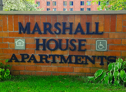 Monument sign for Marshall House Apartments.