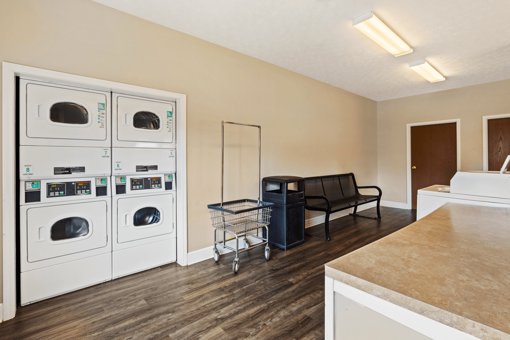 Onsite laundry facility at Briarwood Apartments in Lafayette, featuring washers and dryers.