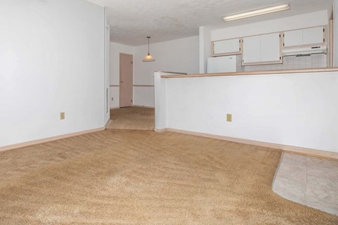 Open concept living and dining space at King's Landing Apartments