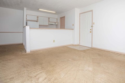 Open concept living and dining space at King's Landing Apartments