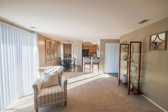 Living Room at Archer's Pointe Open concept living space at Archers Pointe. - Photo Gallery