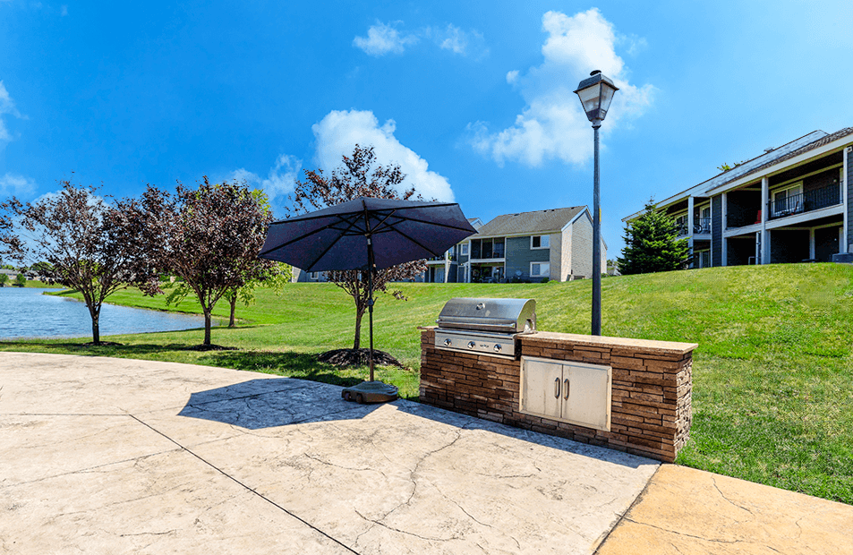 Outdoor grill station at Somerset Lakes Apartments, featuring a built-in grill.
