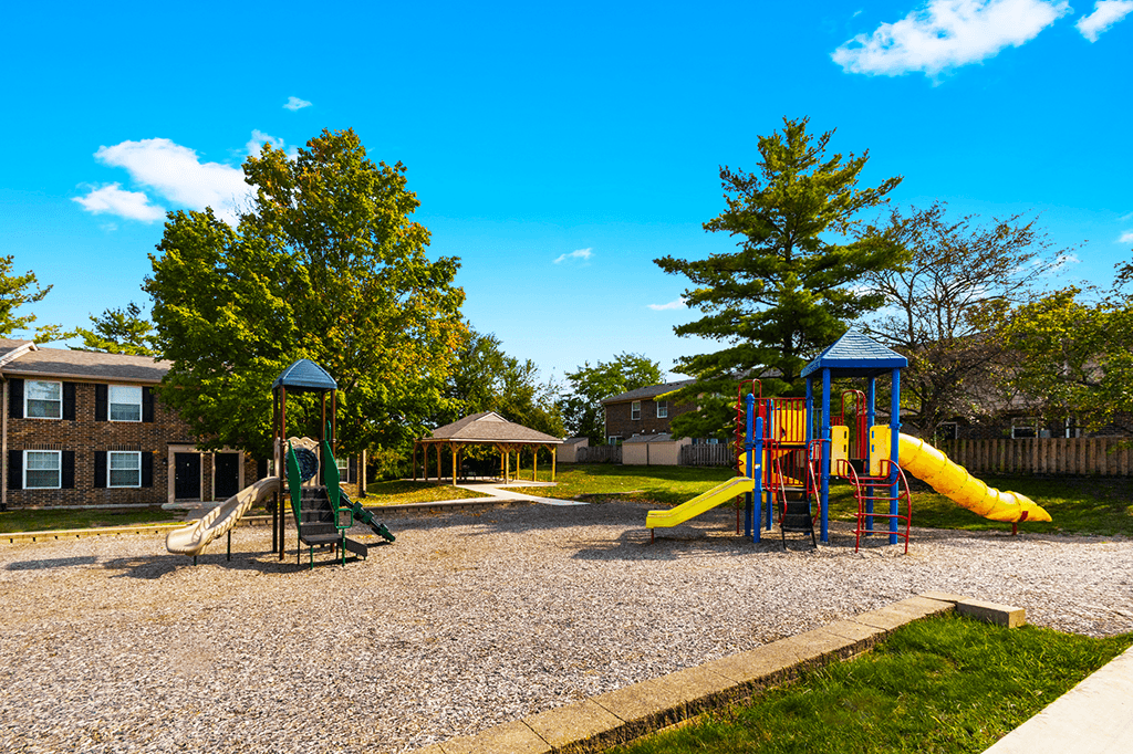 A playground with slides at Carriage House Apartments in Kendallville.