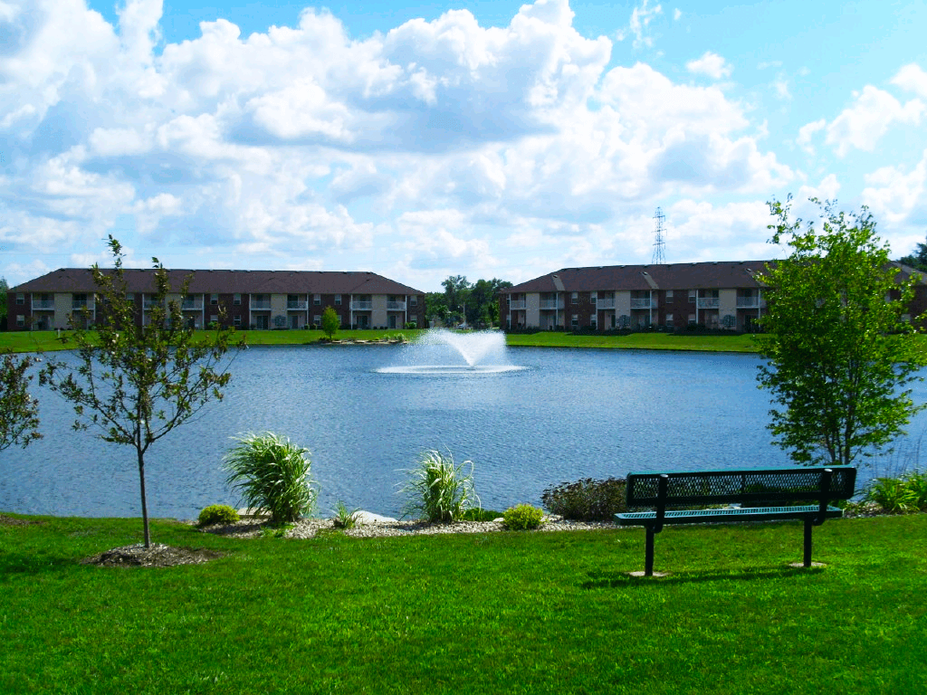 Pond with a fountain at North Lake Apartments.