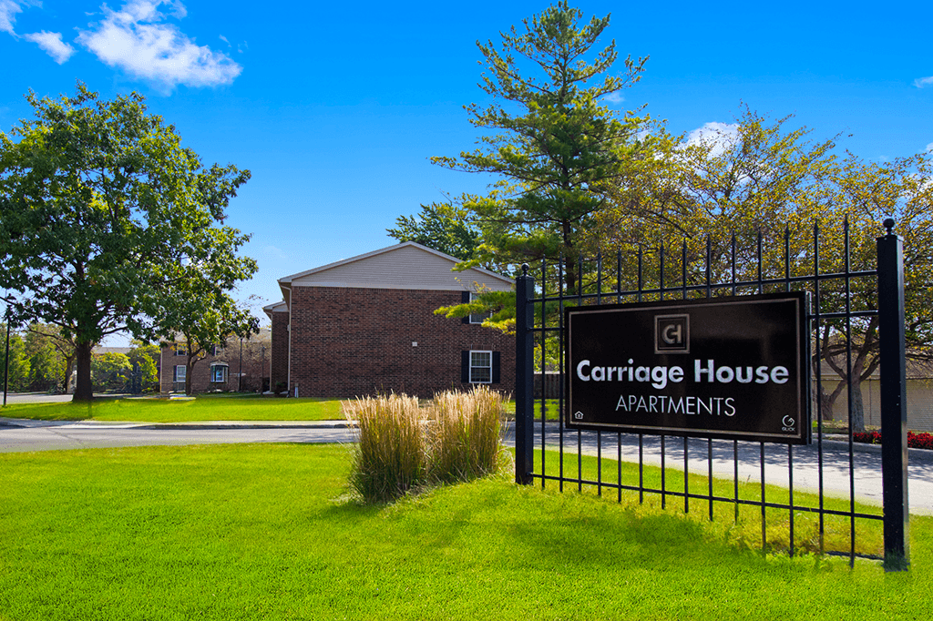 Sign for Carriage House Apartments in Kendallville.