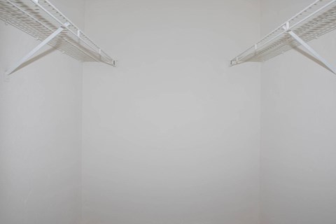 Spacious walk-in closet in a 2-bedroom apartment  at King's Landing Apartments.