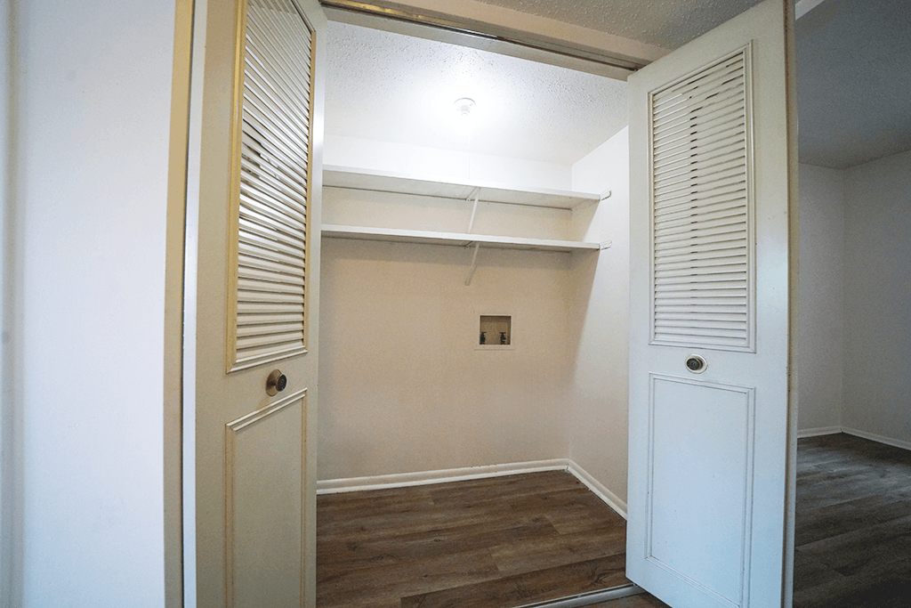 Washer and dryer hook-up in a 2-bedroom townhome at Rainbow Hills Apartments.