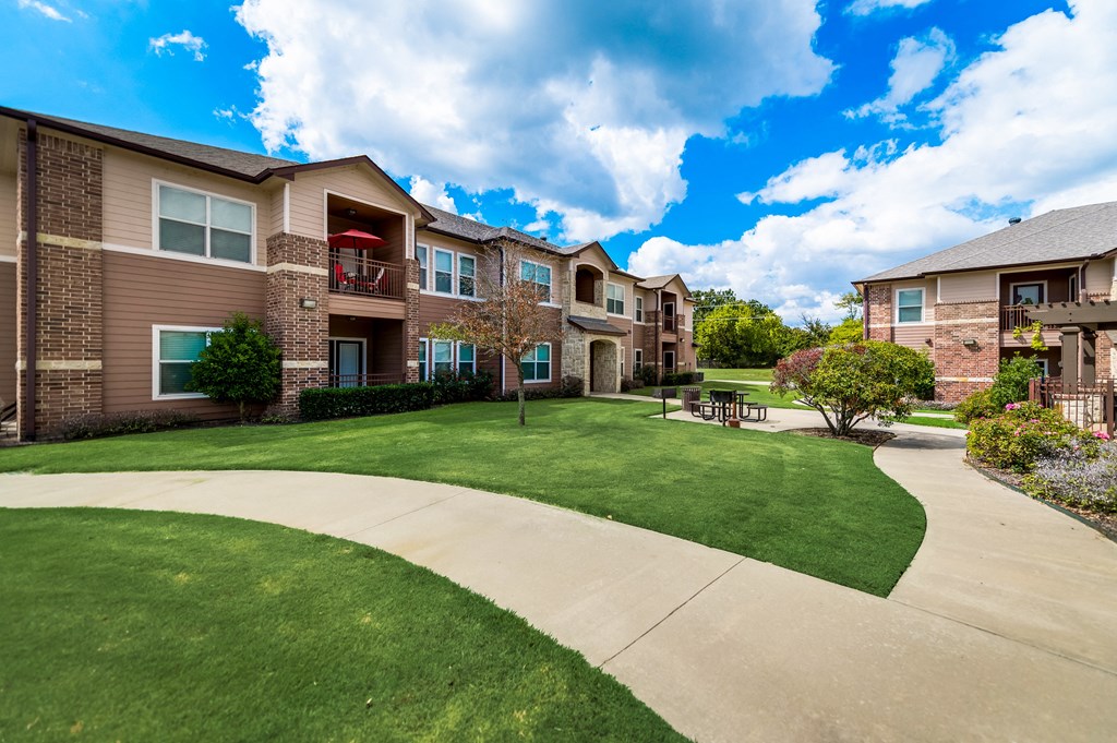 our apartments have a spacious yard and green grass
