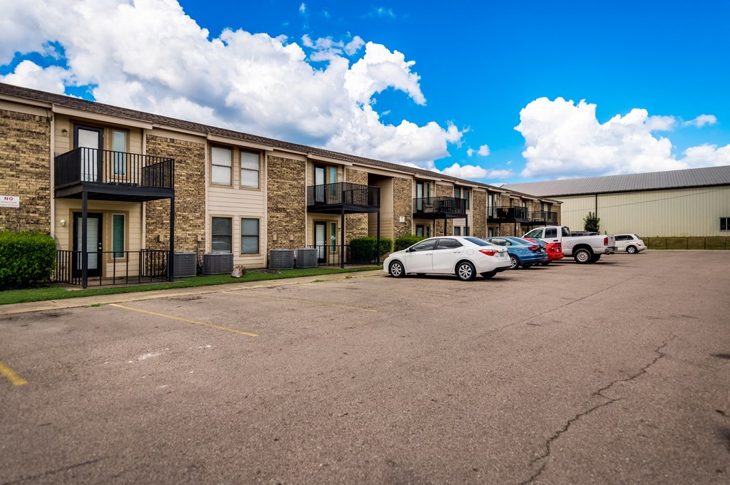 a parking lot at The Corners Apartments in Sulpher Springs TX