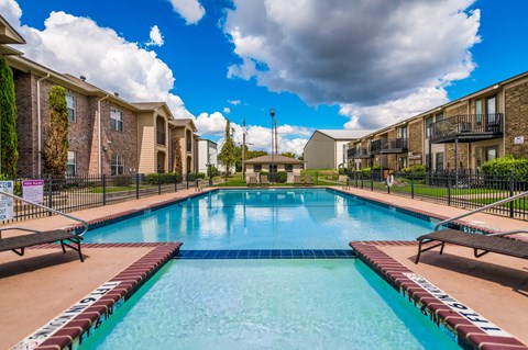 the preserve at ballantyne commons pool and apartment buildings