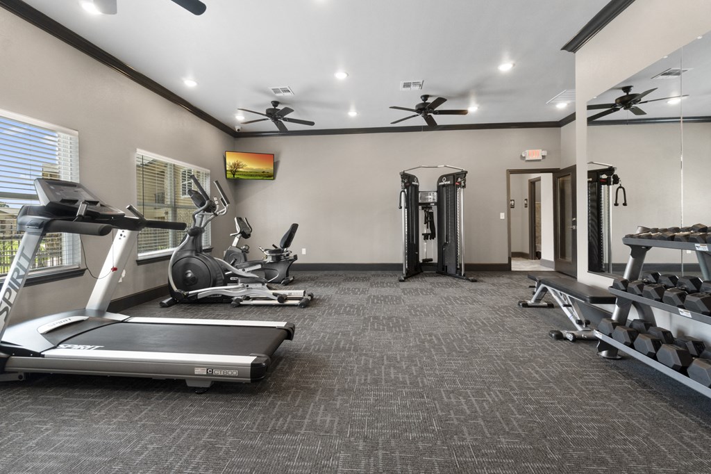 the gym with treadmills and other exercise equipment at the enclave at woodbury